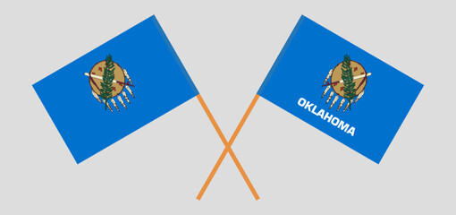 Crossed flags of The State of Oklahoma. Official colors. Correct proportion
