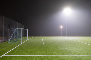 Fototapeta na wymiar Image of soccer field in night with spotlight