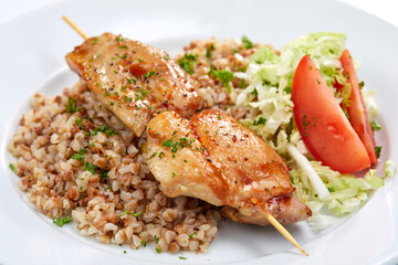 chicken kebab with buckwheat and salad
