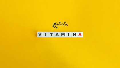 Vitamin A Molecule and Banner. Block Letter Tiles on Yellow Background. Minimal Aesthetics.