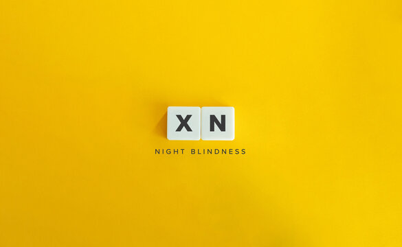 XN Night Blindness Banner. Letter Tiles on Yellow Background. Minimal Aesthetics.