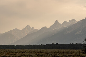 Smoky Teton Range Rises From Flat Valley Below
