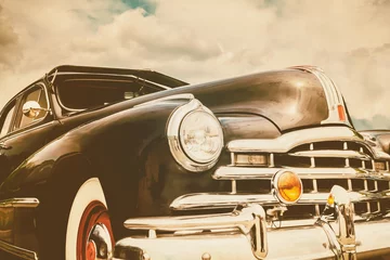 Foto op Canvas Retro styled front view of a black fifties American car © Martin Bergsma