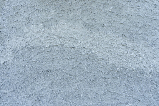The rough gray plaster walls were intended to be beautiful, plaster wall background texture