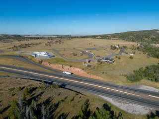 Lincoln monument rest stop off interstate 80 in Laramie Wyoming with semis taken from aerial drone...