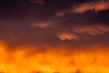 Sunrise Paints A Gradient Of Purple To Orange Over The Clouds