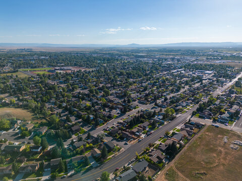 Neighborhood aerial drone picture of cityscape and town with houses and homes from air from aerial drone