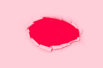 Obraz na płótnie Canvas Top view of pink torn paper on red background. Free space for text banner