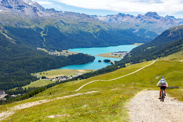 descent with mountain bike to Sankt Moritz in Switzerland - 528504278