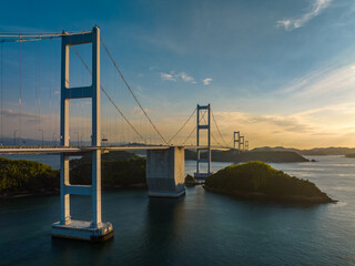 Side view of Kurushima bridge leading to Imabari as sun sets