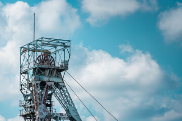 The mine shaft of the mine against the blue sky. Knurów, Poland