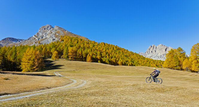 autumn excursion with mountain bike in the Cancano area in Bormio in Valtellina, Italy