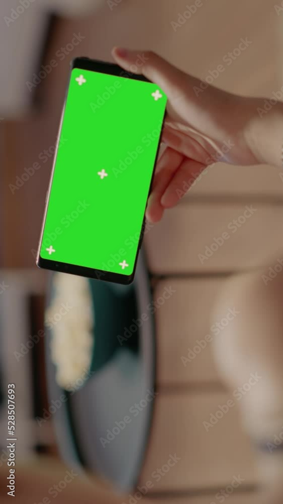 Poster close up of horizontal smartphone with green screen used for chroma key with isolated media backgrou