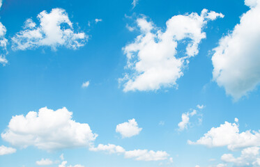Naklejka na ściany i meble cloudy landscape on a light blue sky