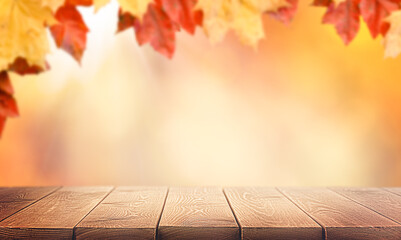 Naklejka na ściany i meble empty wooden table and autumn leaves, autumn mixed background