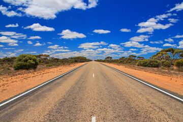 Fototapeta premium Long straight road across Australia