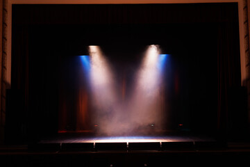 Theatrical scene without actors, scenic light and smoke