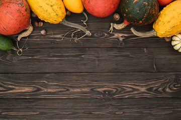 Pumpkin decoration border on wooden background