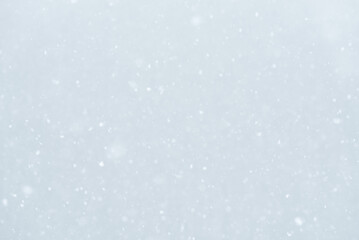 Abstract winter background with falling snow