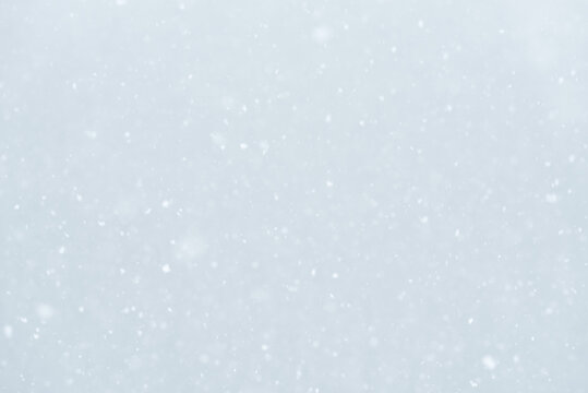 Abstract winter background with falling snow