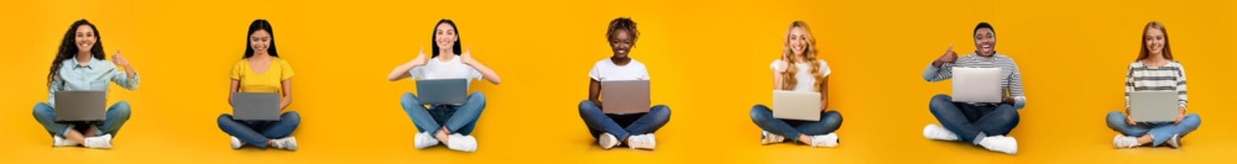 Smiling young different women sitting with laptop, show thumb up, approving device