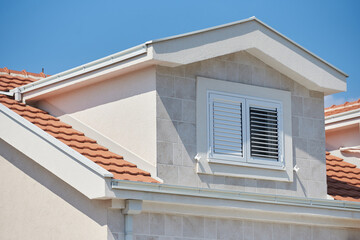 Window with white shutters in modern house