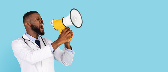 Medical News. Angry black male doctor in uniform screaming with megaphone