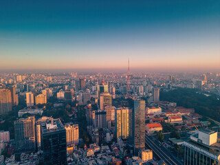 Aerial panoramic cityscape view of Ho Chi Minh city and Saigon river, Vietnam. Center of heart business at downtown with buildings and towers.