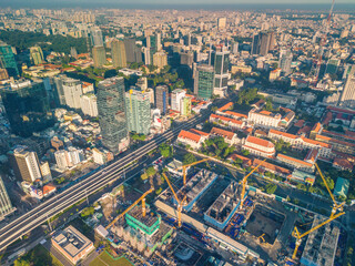 Fototapeta na wymiar Aerial panoramic cityscape view of Ho Chi Minh city and Saigon river, Vietnam. Center of heart business at downtown with buildings and towers.