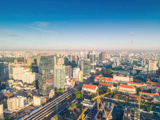 Aerial panoramic cityscape view of Ho Chi Minh city and Saigon river, Vietnam. Center of heart...