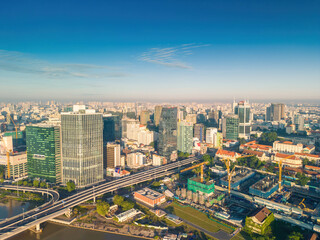 Aerial panoramic cityscape view of Ho Chi Minh city and Saigon river, Vietnam. Center of heart business at downtown with buildings and towers.