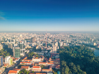 Aerial panoramic cityscape view of Ho Chi Minh city and Saigon river, Vietnam. Center of heart business at downtown with buildings and towers.