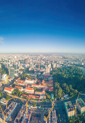 Aerial panoramic cityscape view of Ho Chi Minh city and Saigon river, Vietnam. Center of heart business at downtown with buildings and towers.