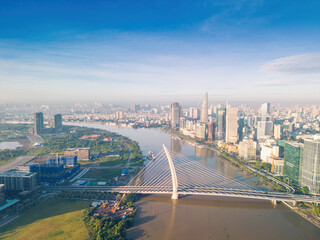 Aerial view of Ho Chi Minh City skyline and skyscrapers on Saigon river, center of heart business...