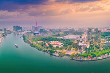 Aerial view of Ho Chi Minh City skyline and skyscrapers on Saigon river, center of heart business at downtown. Morning view. Far away is Landmark 81 skyscraper