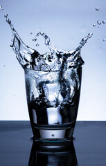 The image of pouring drinking water, into a glass,