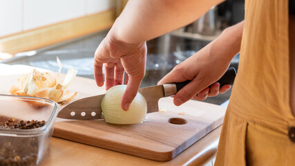 young adult cooking vegan food