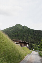 Landscape with countryside road to country house