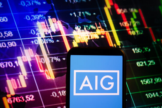 KONSKIE, POLAND - September 04, 2022: Smartphone displaying logo of American International Group (AIG) company on stock exchange chart background
