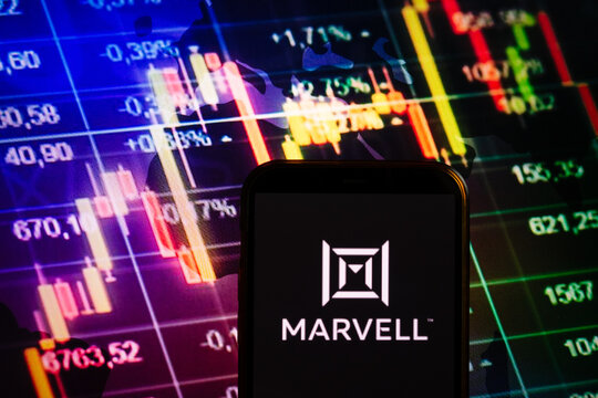 KONSKIE, POLAND - September 04, 2022: Smartphone displaying logo of Marvell Technology Group company on stock exchange chart background