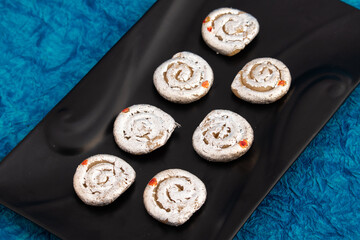 Indian Mithai Kaju Jalebi Also Known As Kaju Katli, Kaju Dilkhush Is Spiral Shaped Sweet Made Of Cashew Nut Powder, Kajoo, Mawa, Mava, Malai, Khoya, Doodh, Badam, Khoa, Badaam, Pista In Sugar Syrup