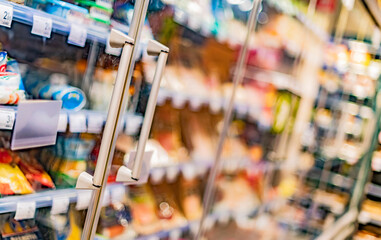 Food products displayed in a commercial refrigerator