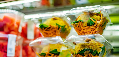 Ready to eat meals displayed in a commercial refrigerator