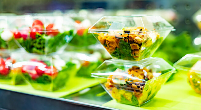 Ready to eat meals displayed in a commercial refrigerator