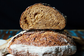 Freshly baked bread with a golden crust close up. Yeast dough. Concept of bakery products, bakery and healthy eating