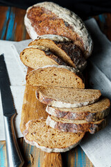 Freshly baked bread with a golden crust close up. Yeast dough. Concept of bakery products, bakery and healthy eating