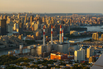 Aerial view of NYC and Queens at sunset.