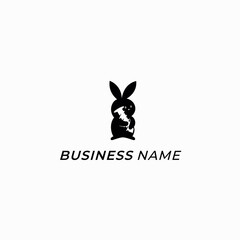 design logo negative space rabbit and screw