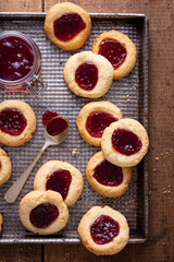 Argentinian traditional cookies called Pepas filled with jam placed on old iron tray