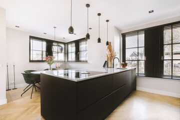 Kitchen zone with counter in modern studio apartment